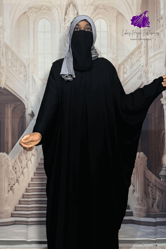 front view of black batwing bisht abaya