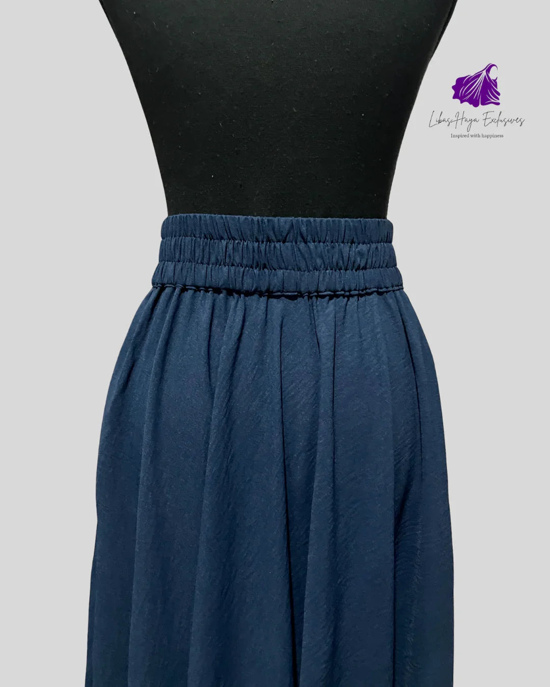 back of Navy blue skirt showing  elastic waistband 