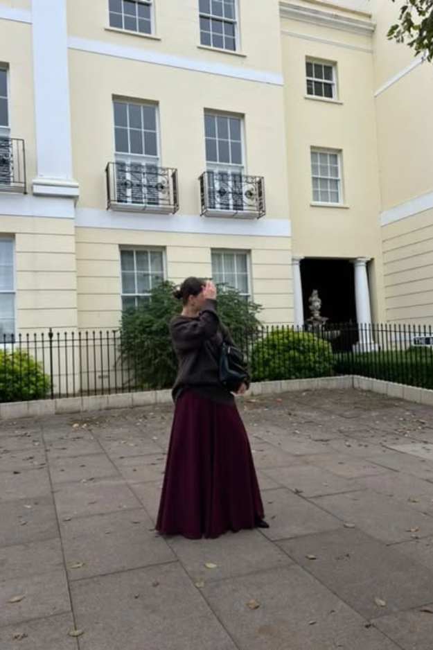 woman wearing hiba maxi skirt in burgundy