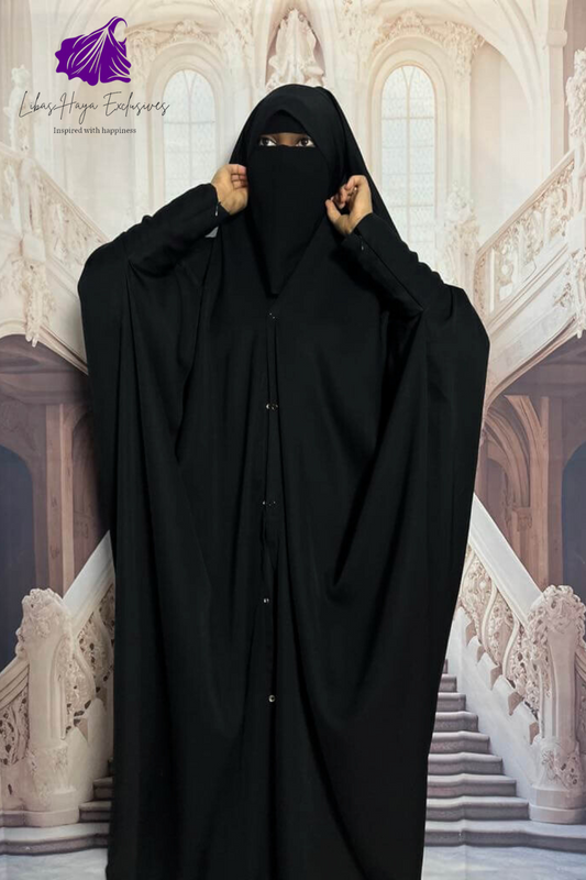  front view muslim woman in  black burqa with arms up