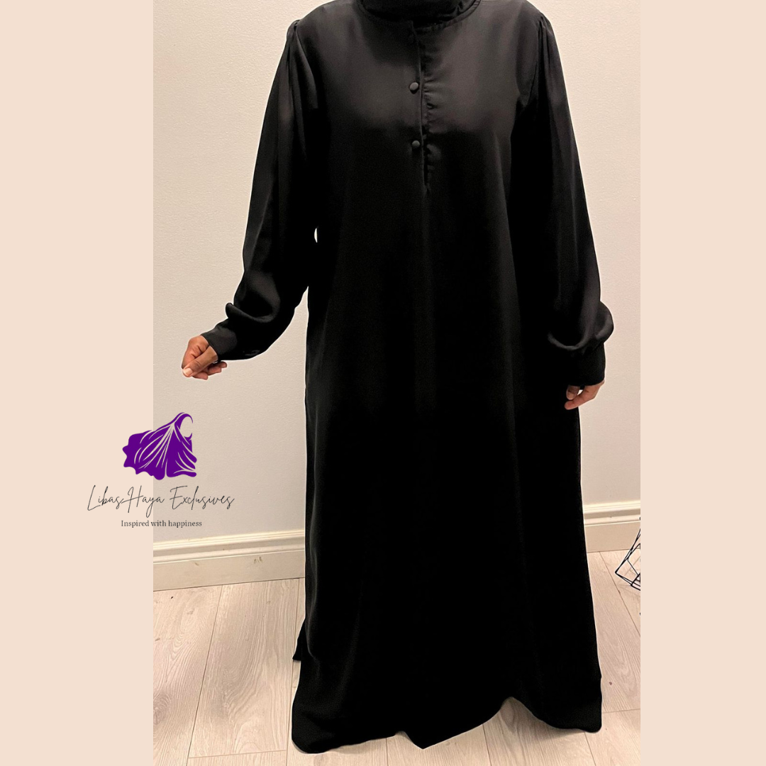 Abaya, Huda Uniform Abaya with gathered back and cuff sleeve in black. (Ships to North America)