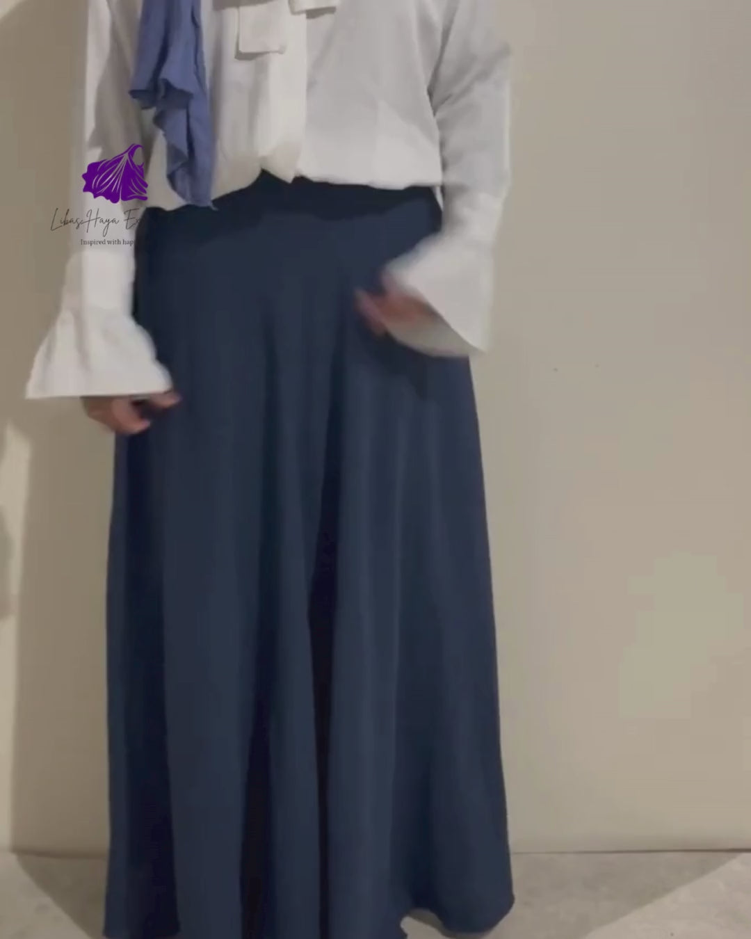 video of navy blue hiba maxi skirt