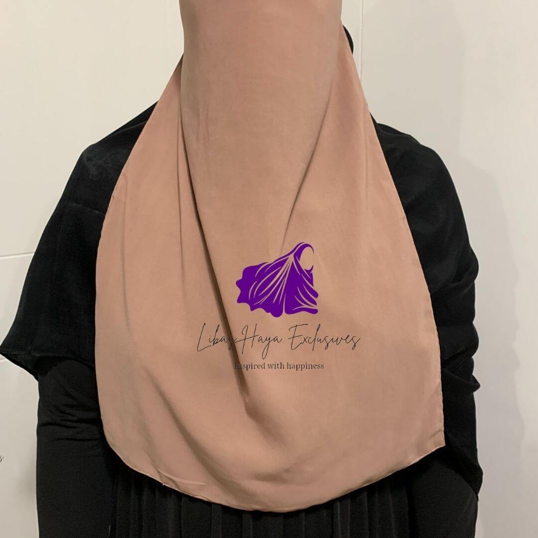 Our Raahah -Half Niqab in Dusty Pink is the perfect choice for niqabi's looking for the ultimate niqab comfort!  With the niqab having strings at the back, you can easily wear them with any hairstyle of the day. The shade dusty pink is just the color you need if you are going for that casual chic vibe!  Breathable Comfortable Soft to the touch More coverage (increased length and width)