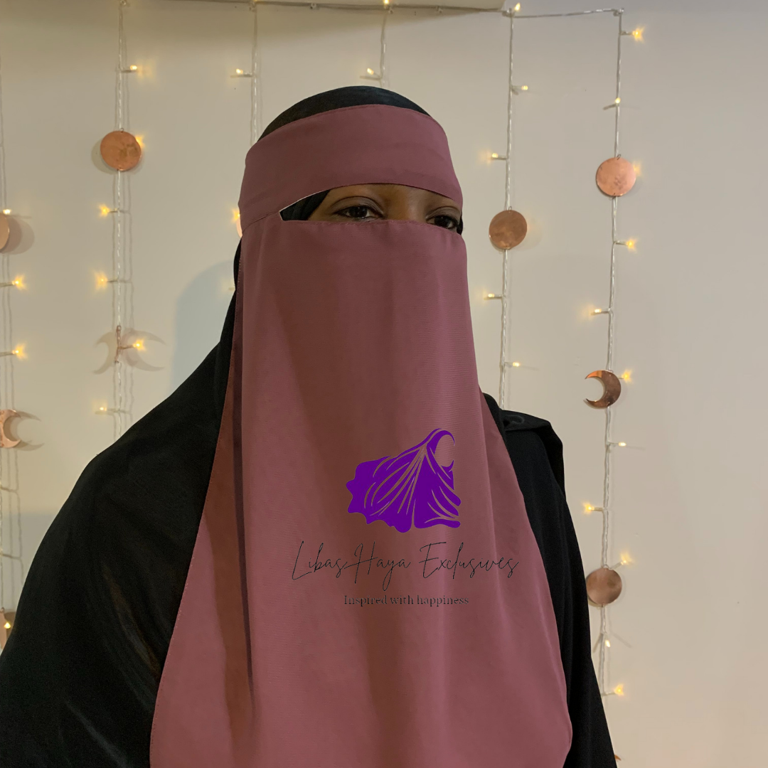 Our Raahah - Single piece Reversible Niqab, you didn't know you needed. Imagine having a niqab that gives you this: Less expense and Two colors, all in one!  This niqab does just that!  With its design being two-in-one, you don't have to buy multiple niqabs to match your outfit. They are super soft, breathable, and lightweight. Each side having a solid color that is not visible on the other, making these a ''Staple piece'' niqab. * This product ships from our Trinidad & Tobago Warehouse.